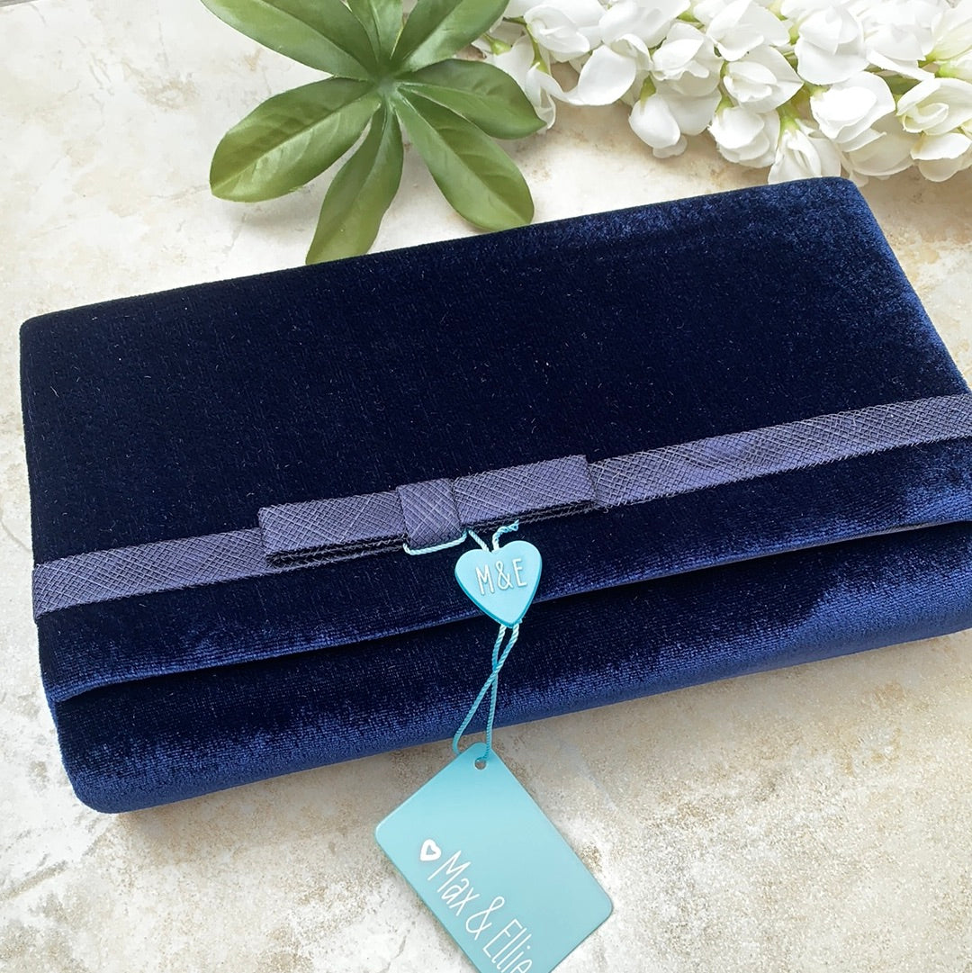 Navy velvet clutch on sale bag