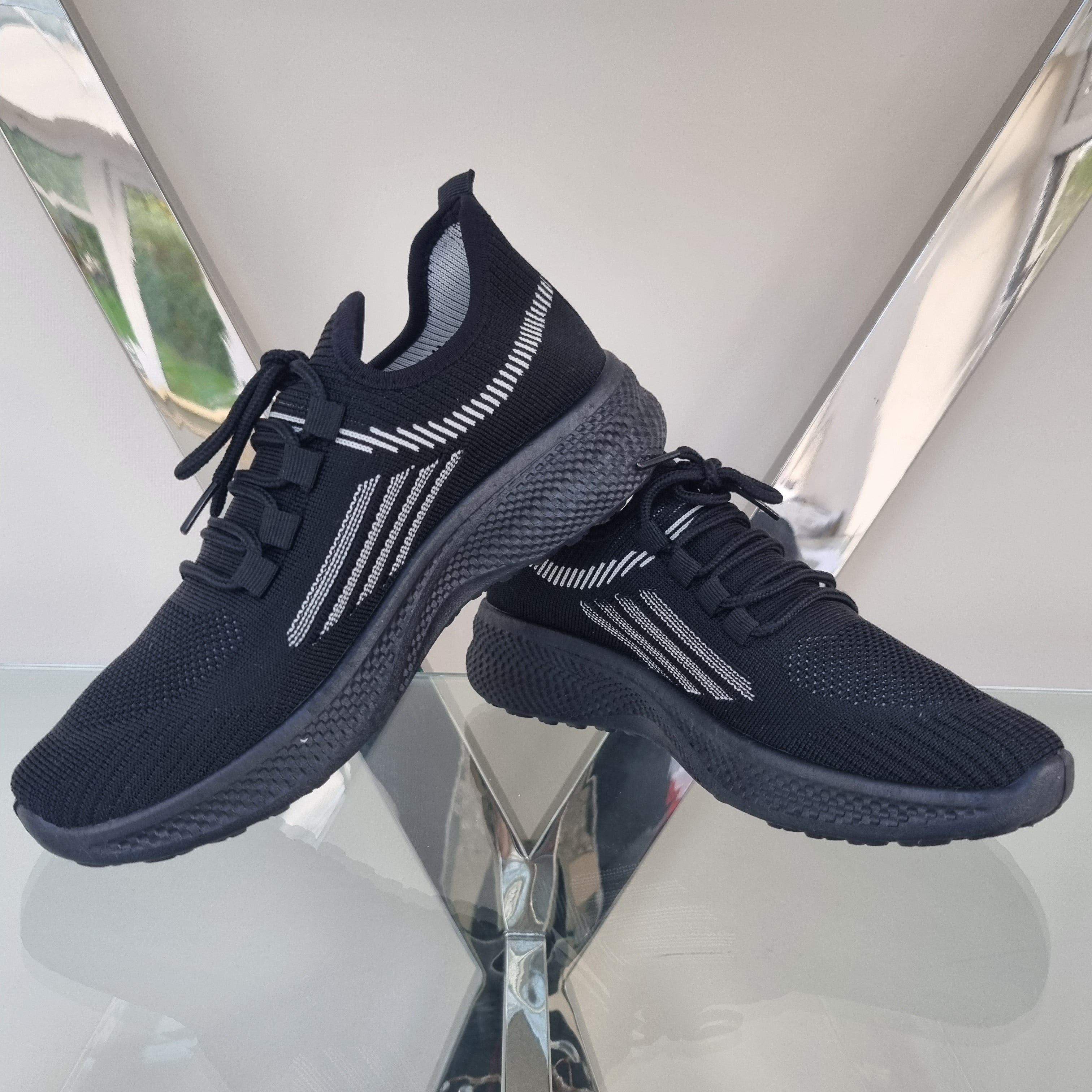 Black store fashion trainers