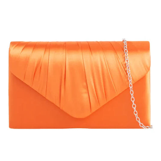 Orange clutch bag with a chain strap on a white background
