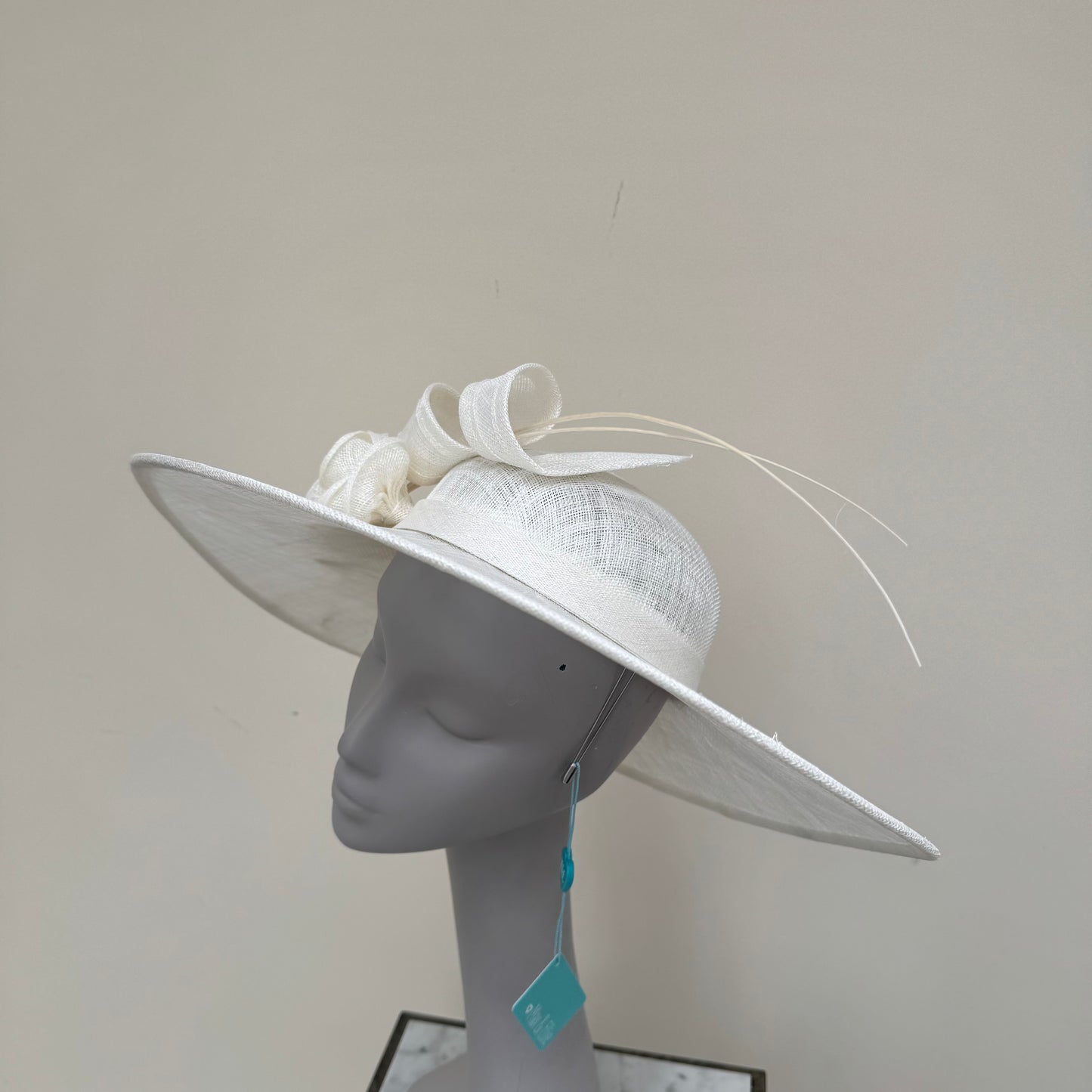 Max and Ellie WD7 Ivory Flat Hatinator on Band