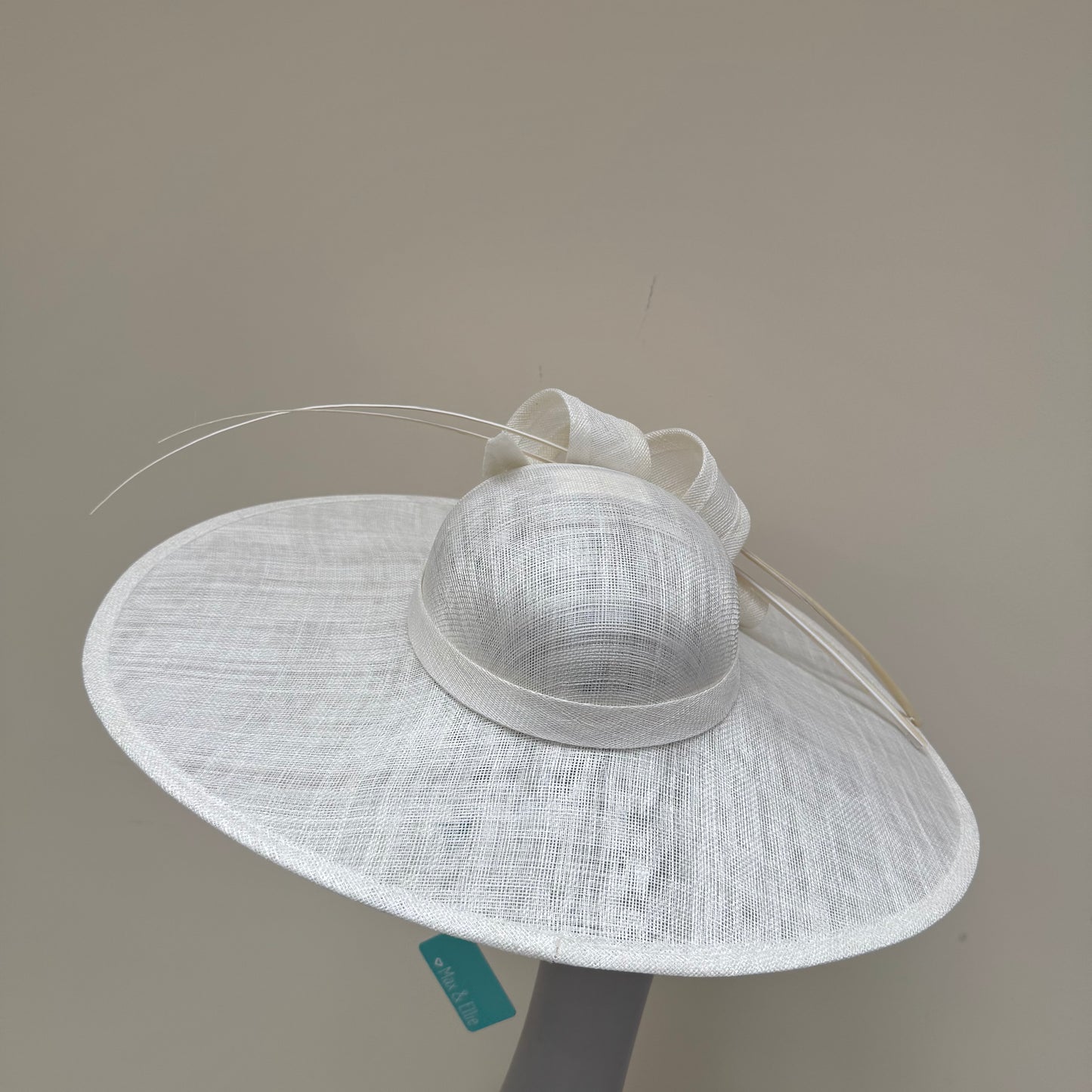 Max and Ellie WD7 Ivory Flat Hatinator on Band