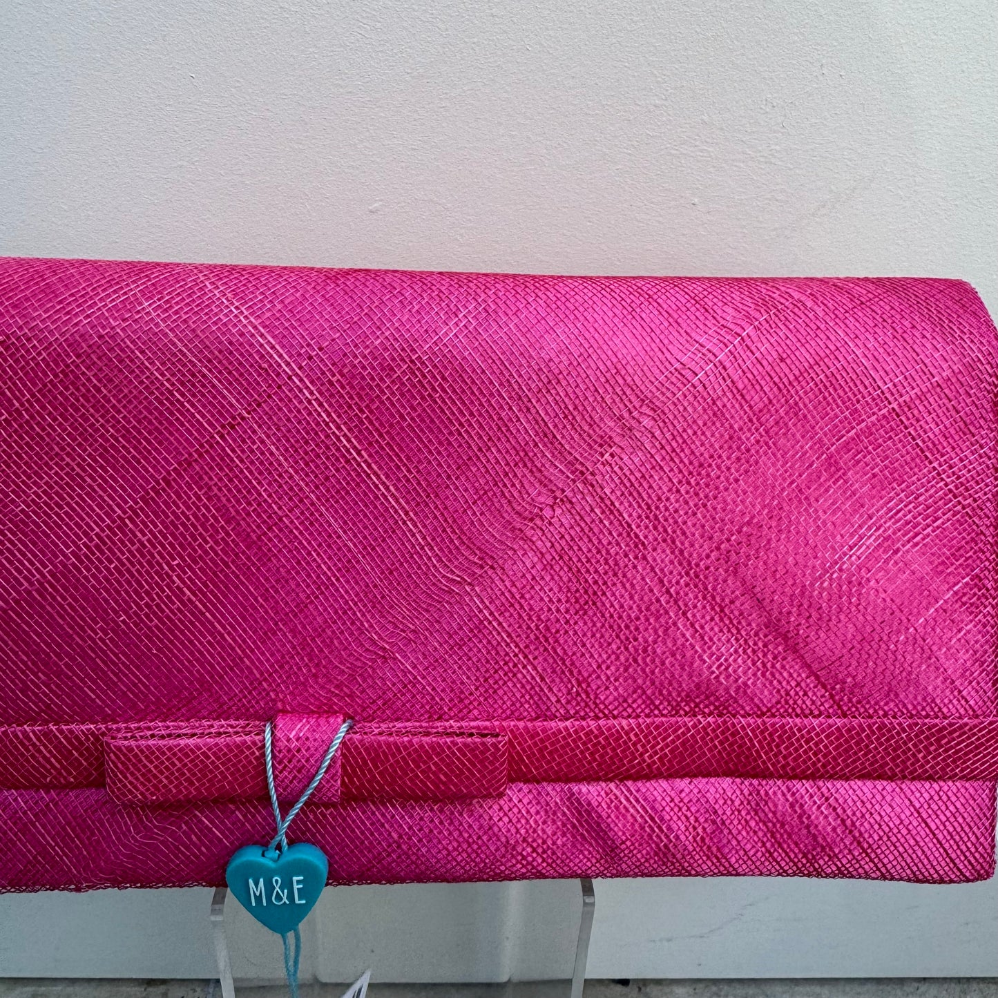 Damaged AX2 Cerise - Sinamay fault on front Cerise